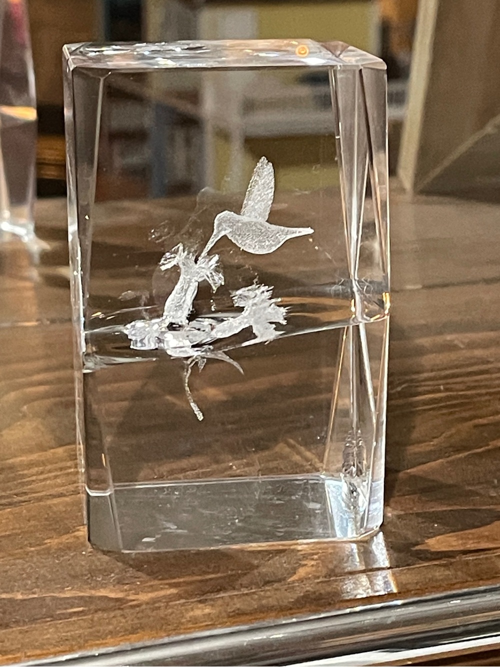 Crystal Hummingbird Paperweight

Has a small chip on the top edge.